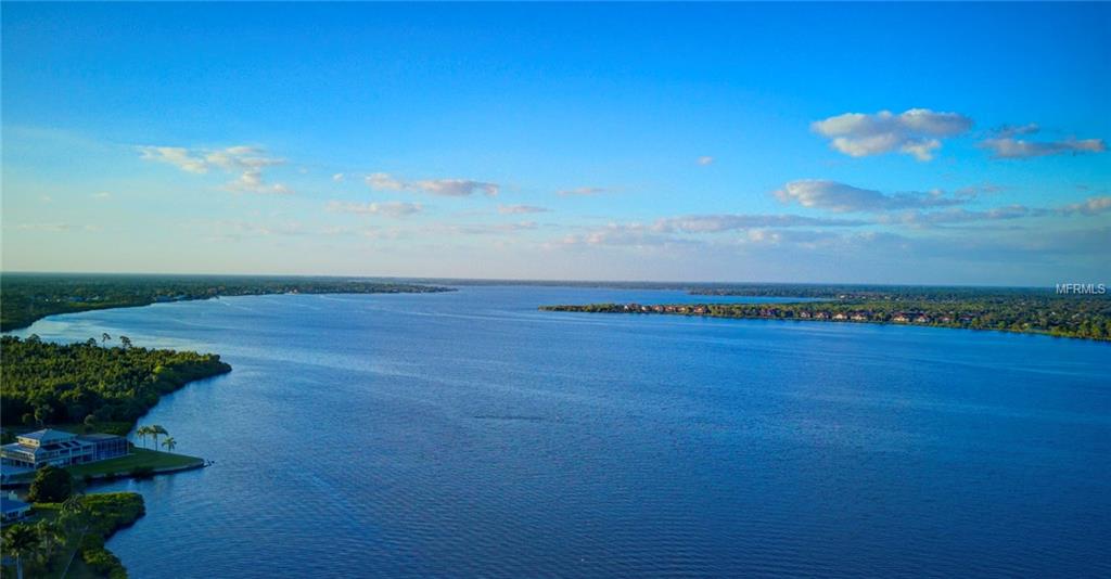 Aerial view of a calm blue bay.