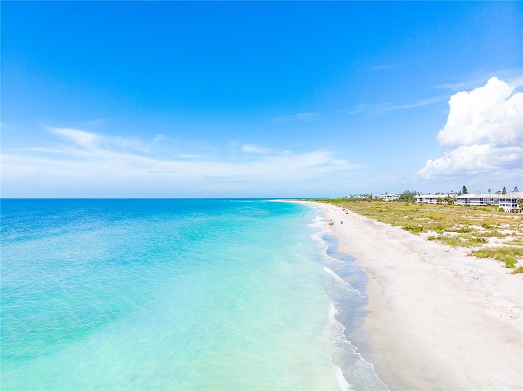 Aerial view of a white sand beach.