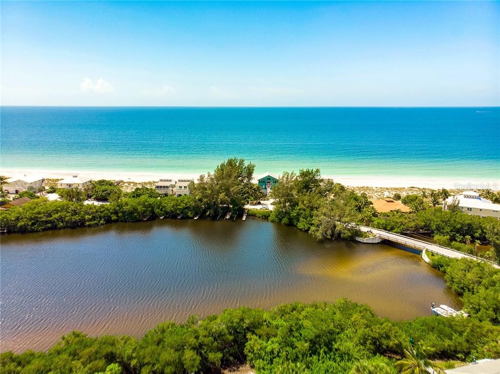 Aerial view of a lagoon near the ocean.