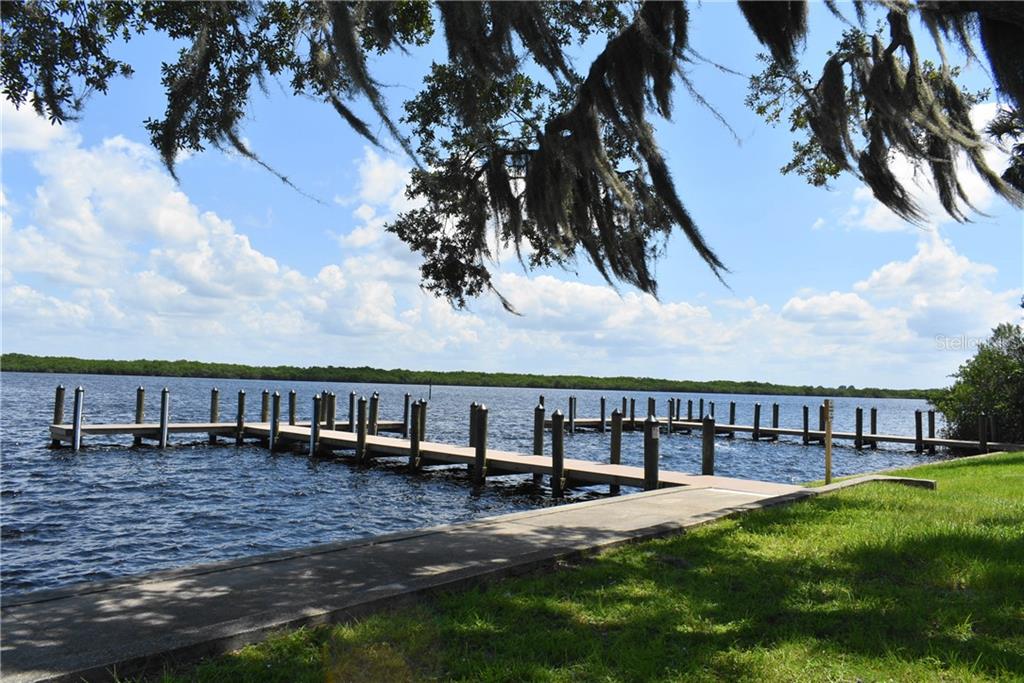 Wooden dock on a calm lake.