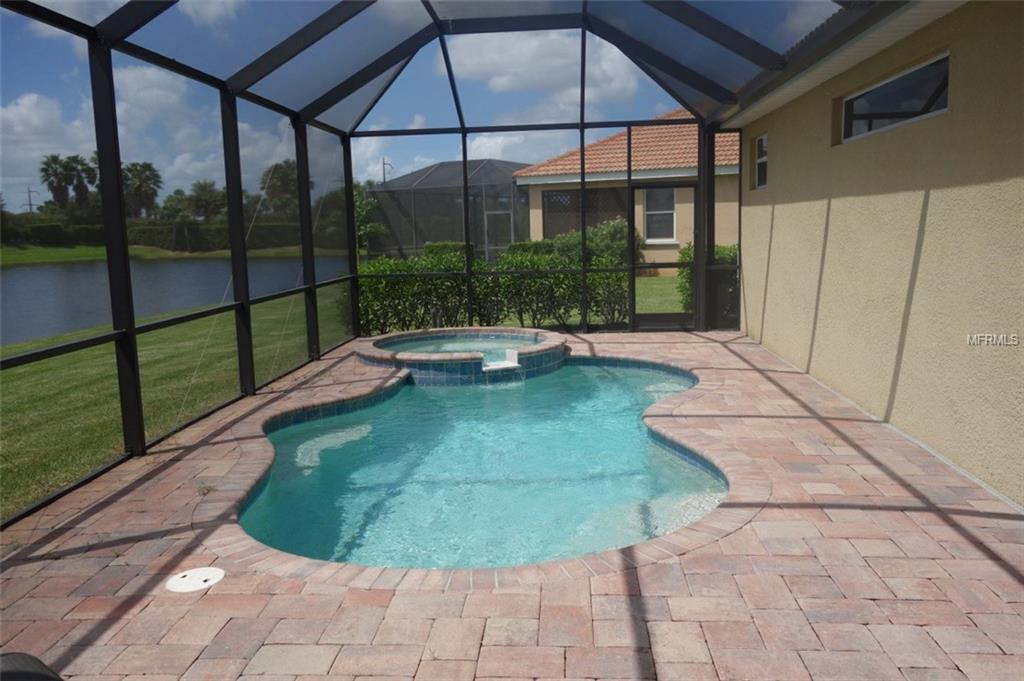 Private pool and spa with patio.