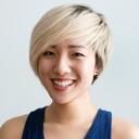 Smiling woman with short blonde hair.