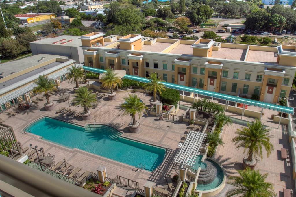 Aerial view of a resort pool and patio.