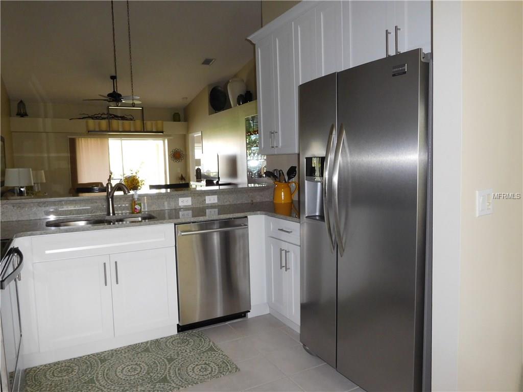 Stainless steel refrigerator in a kitchen.