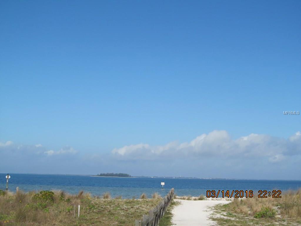 Sandy path leading to the ocean.