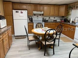 Kitchen with table and chairs in a home.