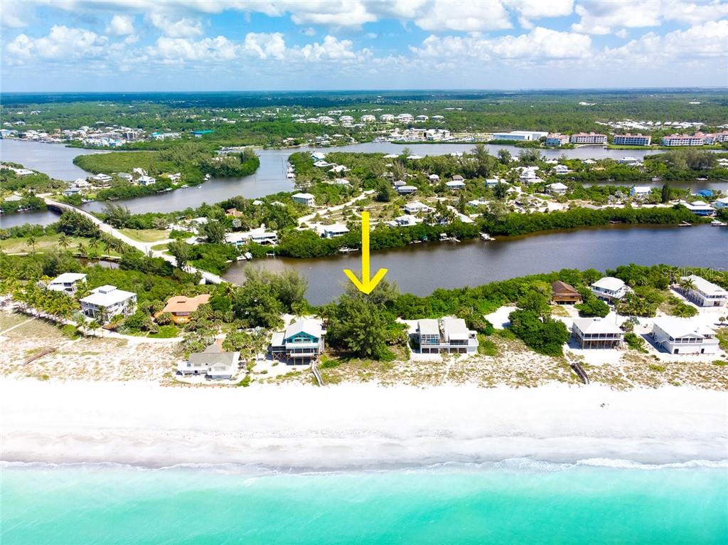 Aerial view of beach houses on the coast.