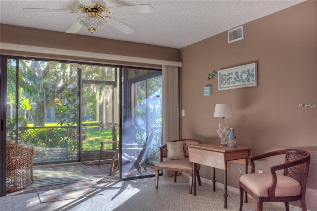 Living room with patio doors and furniture.