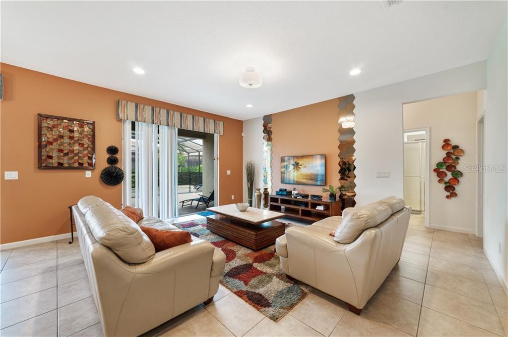 Living room with two couches and a TV.