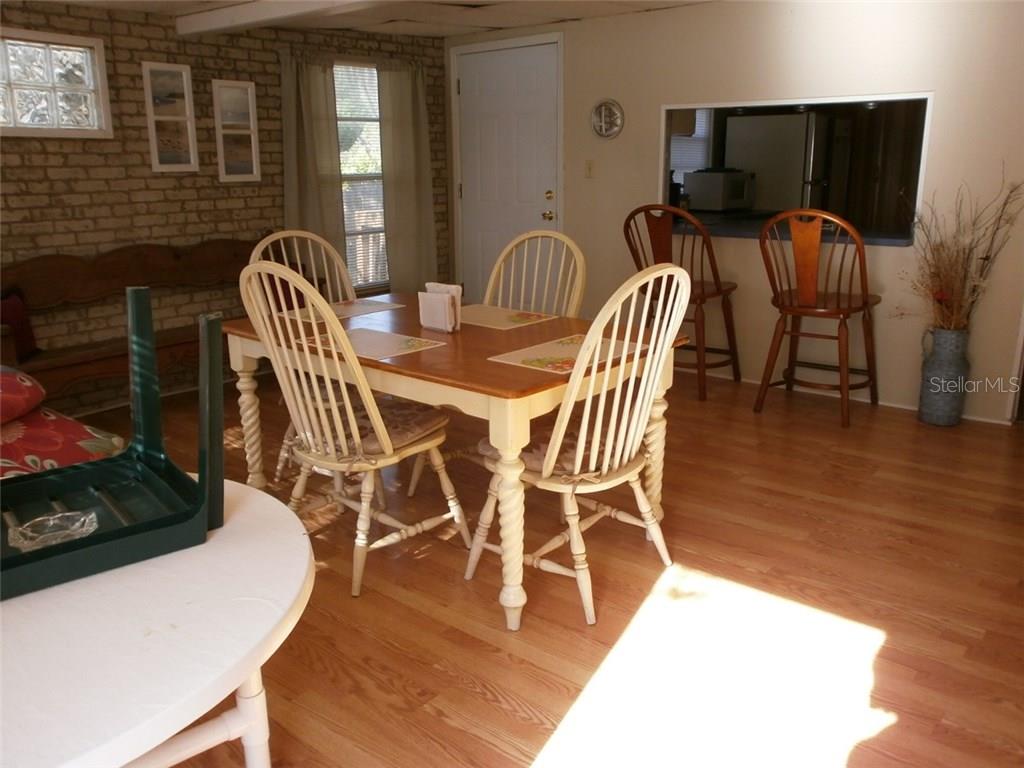 Wooden dining table and chairs in a home.