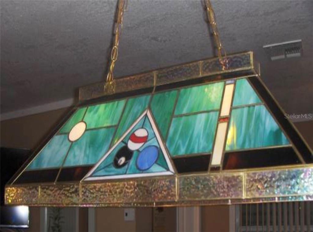 Stained glass billiard light fixture.