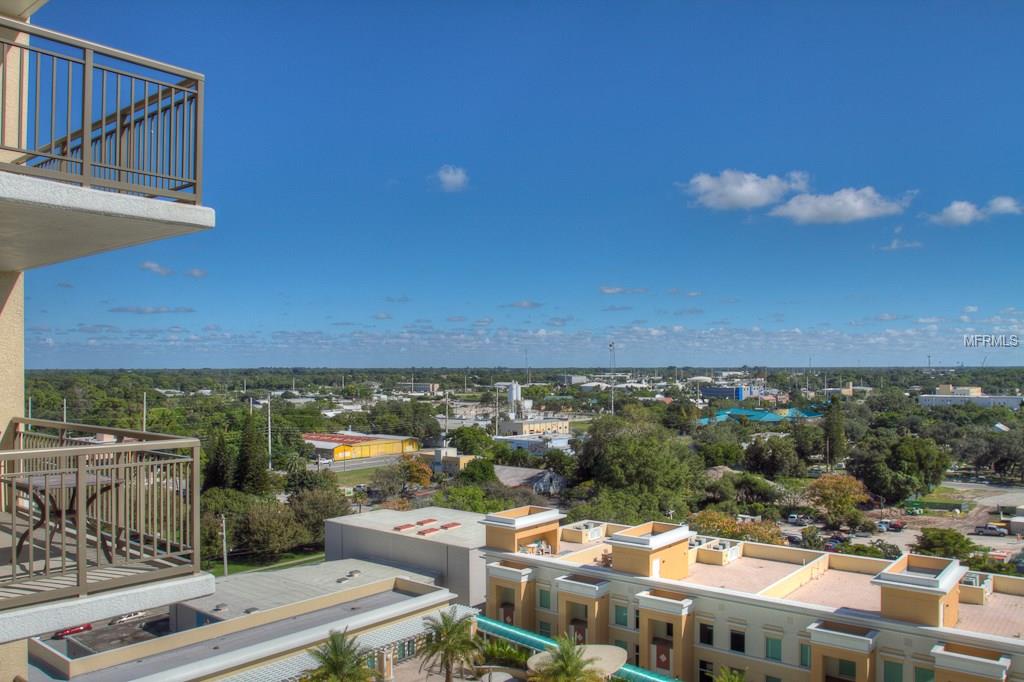 Balcony view of a city skyline.