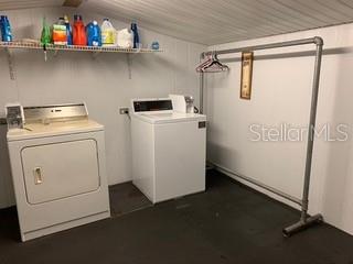 A laundry room with a washer and dryer.