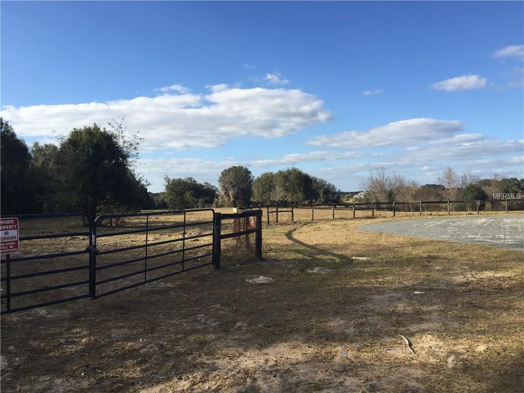 Fenced rural property with a gate.