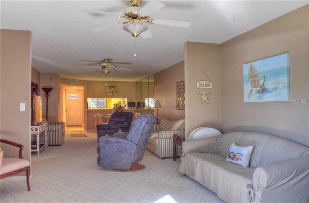 Living room with beach themed decor.