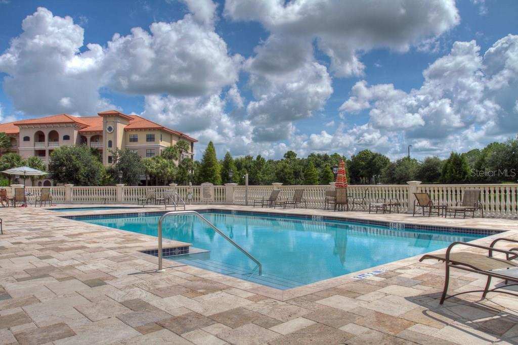 A pool with a blue tiled bottom.