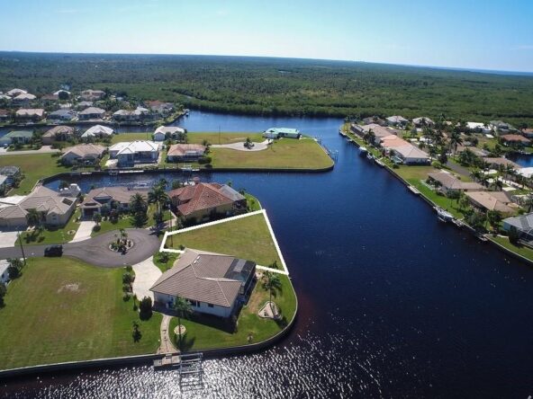 Aerial view of waterfront property lot.