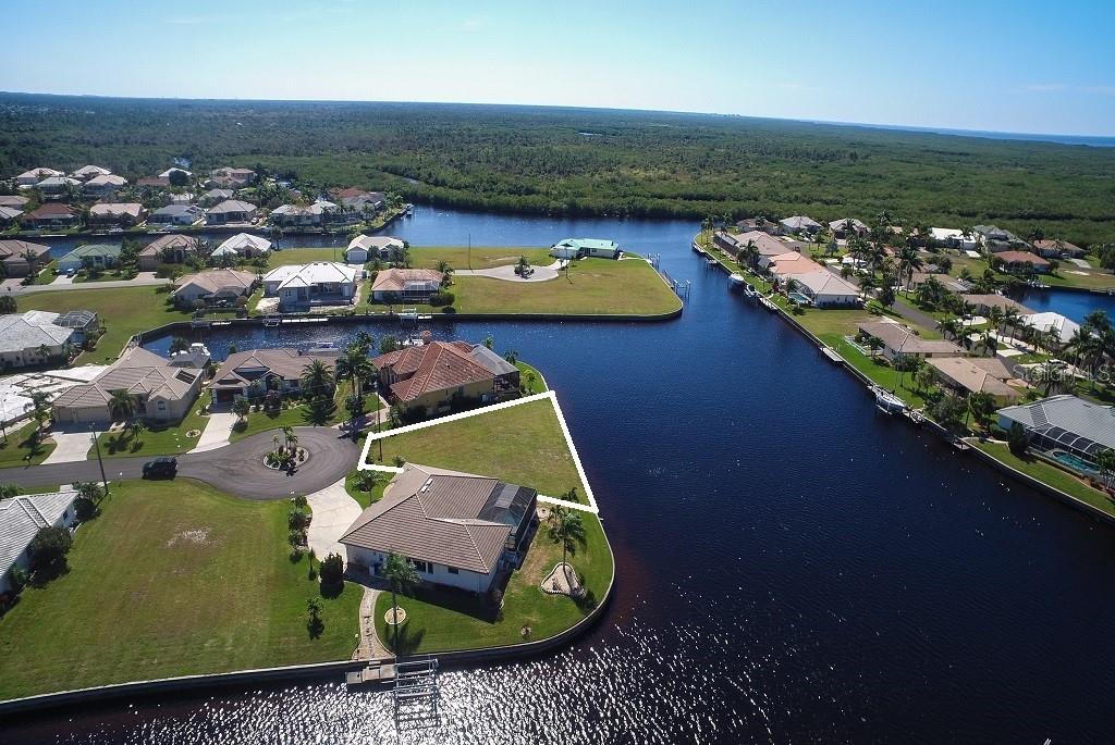 Aerial view of waterfront vacant lot.