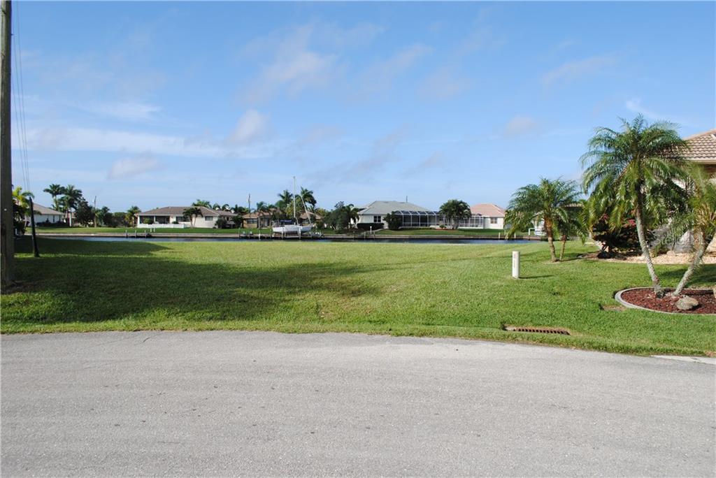 Empty lot with waterfront view.