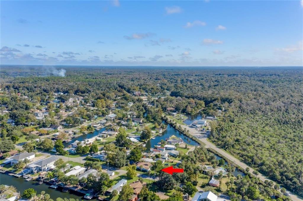 Aerial view of a waterfront neighborhood.