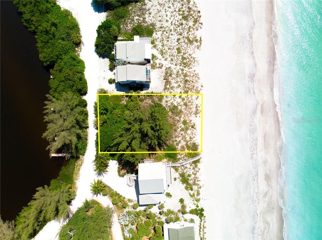 Aerial view of a vacant lot on the beach.