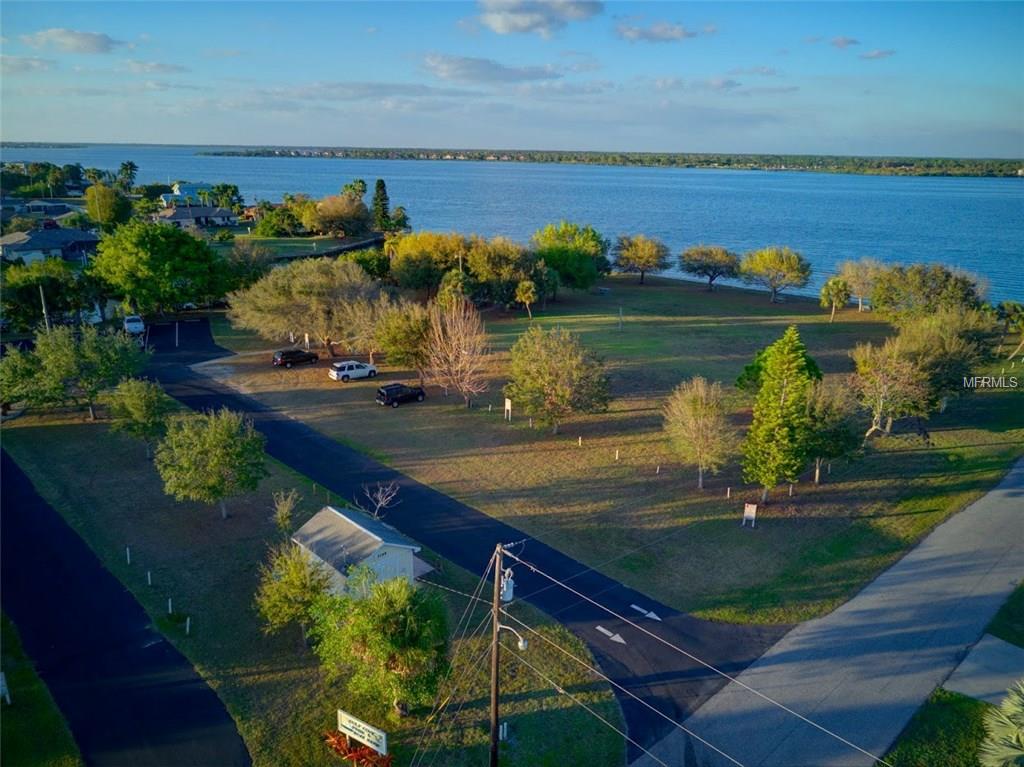 Aerial view of a park by the water.