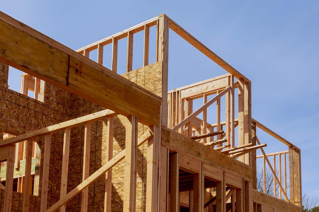 Wooden frame of a house under construction.