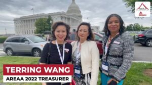 Three women in front of US Capitol building.