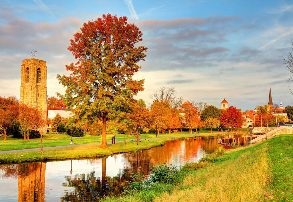 Fall foliage reflecting in a river.