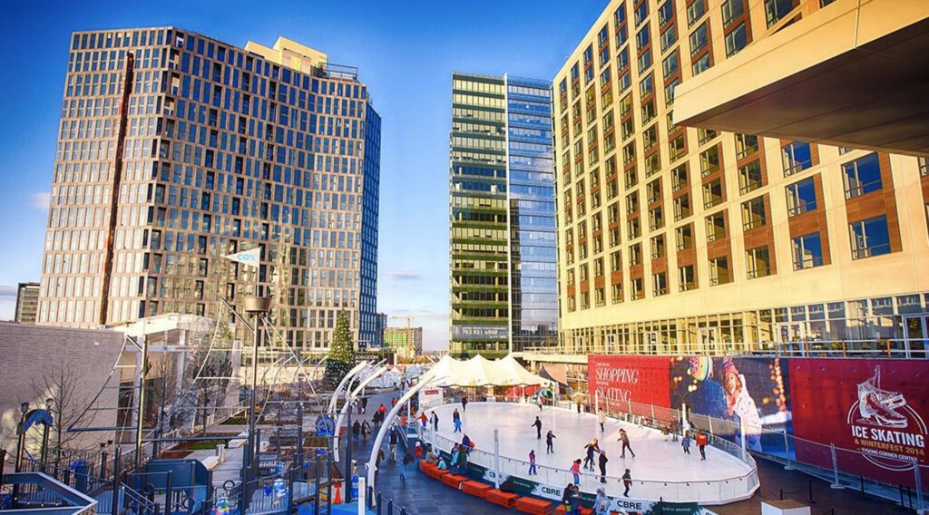 Outdoor ice skating rink in city center.