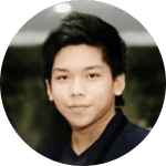 Headshot of a young man smiling.