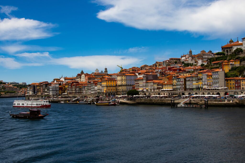 Colorful buildings by the river in Portugal.